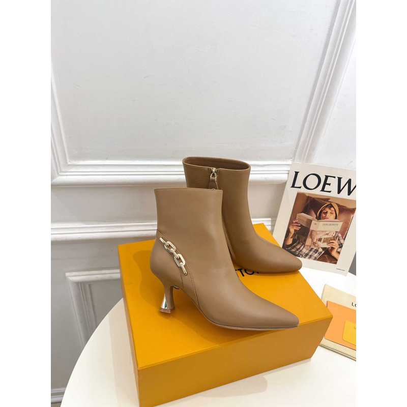 l**is V*t*n ankle heels with chain logo brown