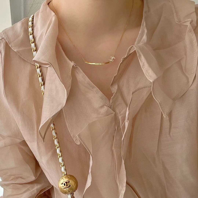 Ch*el gold logo necklace