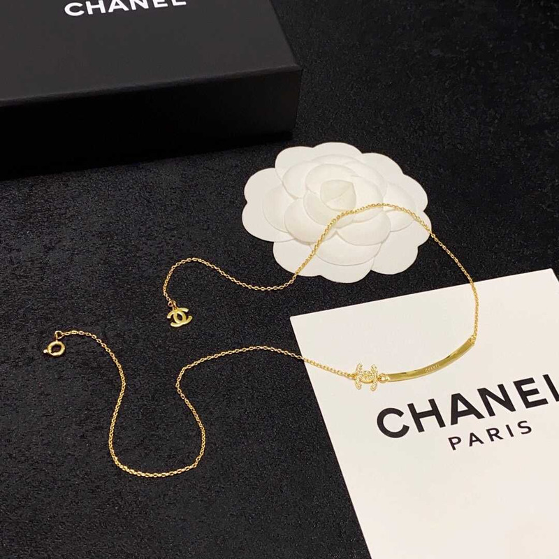 Ch*el gold logo necklace