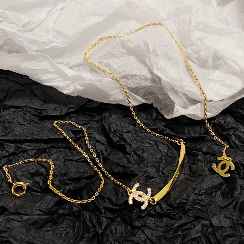 Ch*el gold logo necklace