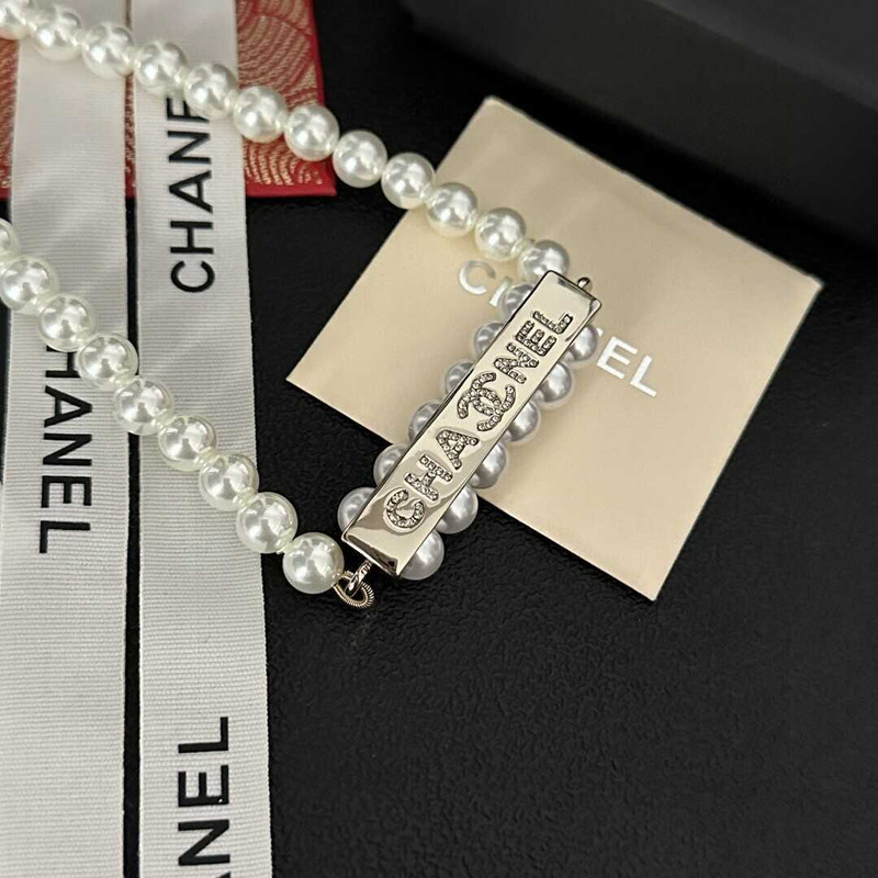 Ch*el pearl logo necklace