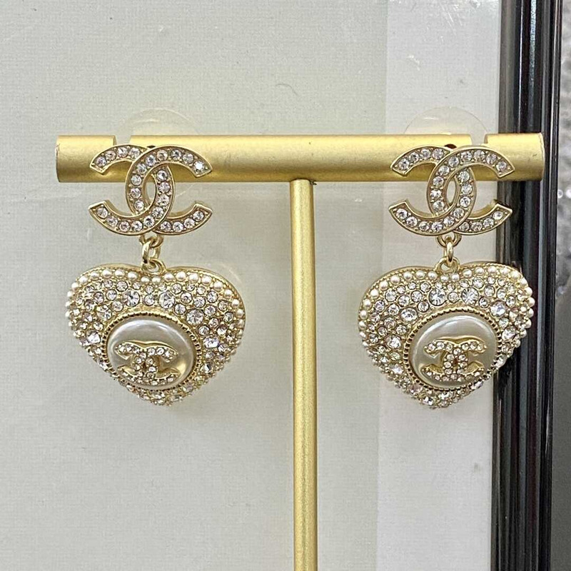 Ch*el cc heart gold tone and crystal earrings