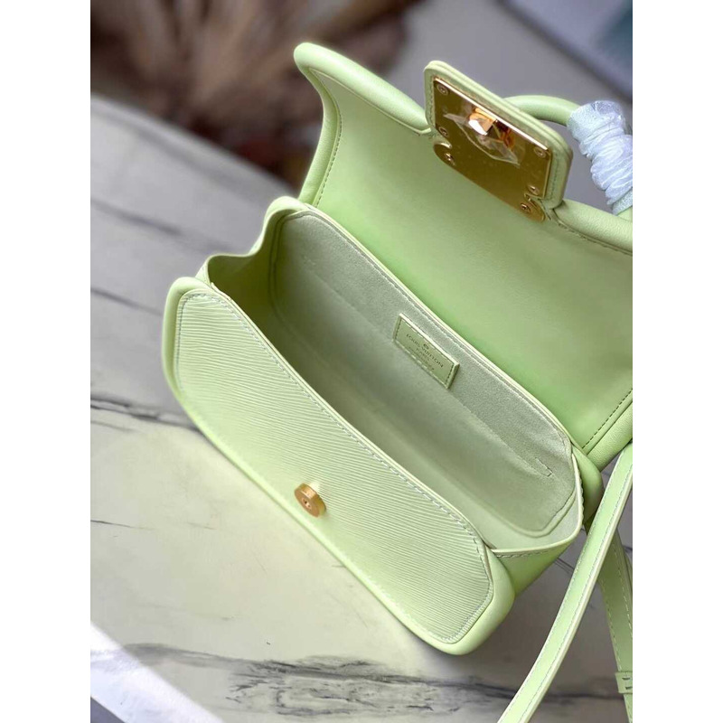 l**is V*t*n hide and seek handbag green