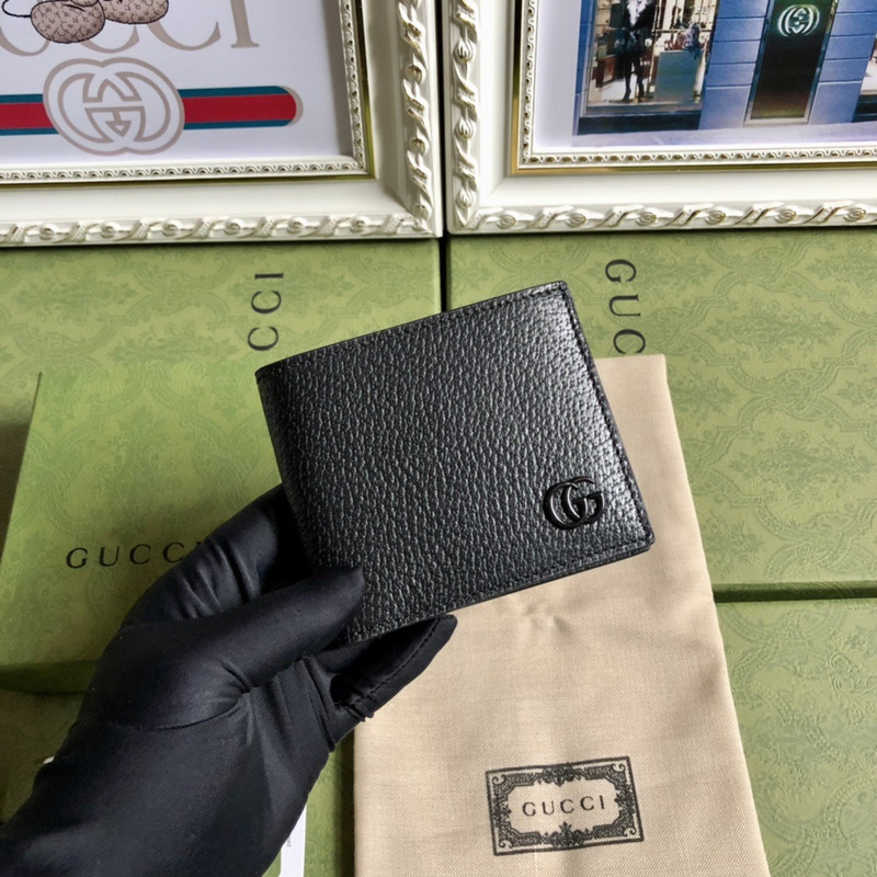 G*u*i leather wallet in black for men