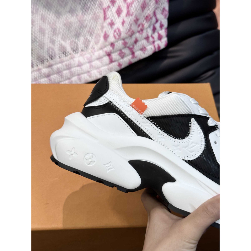 l**is V*t*n x nike sneakers black and white