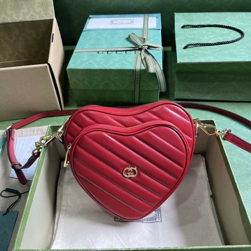 G*u*i heart shape leather bag red