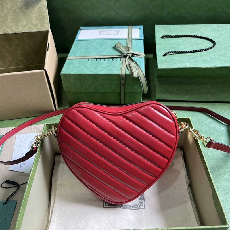 G*u*i heart shape leather bag red