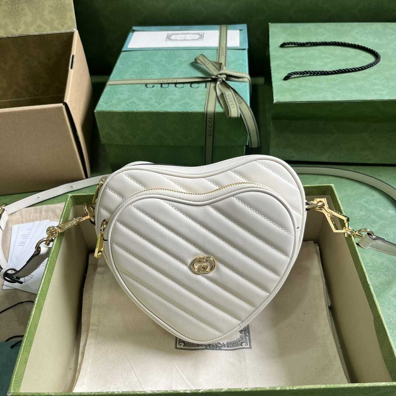 G*u*i heart shape leather bag white