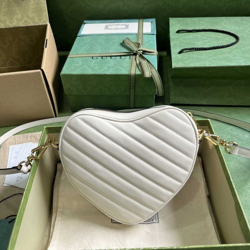 G*u*i heart shape leather bag white