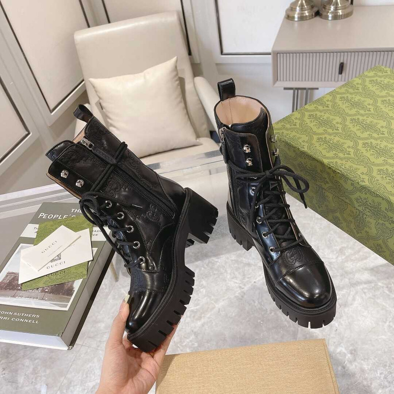 G*u*i gg quilted lace-up ankle boots leather black