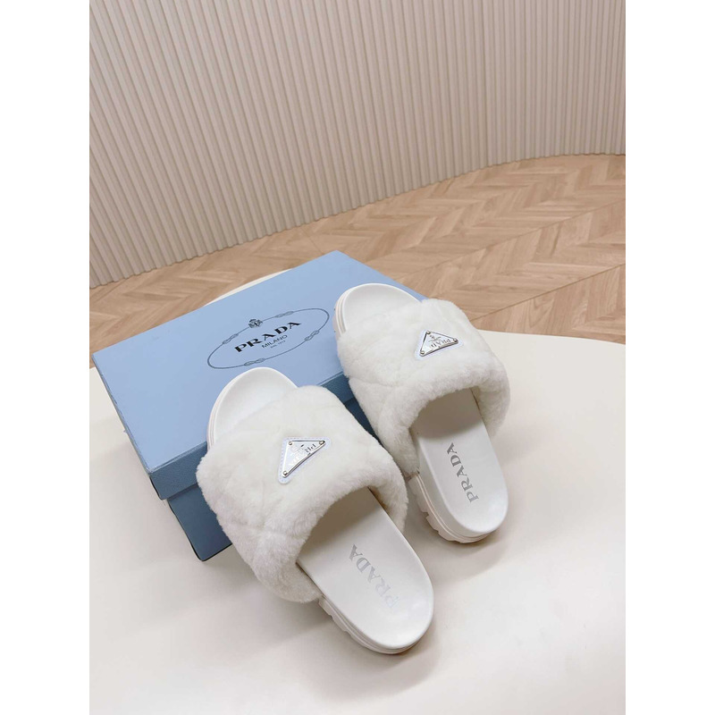 Pra*a sheepskin slip-on sandals white