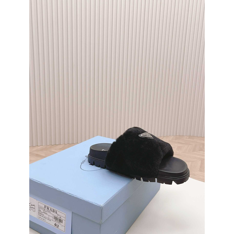 Pra*a sheepskin slip-on sandals black