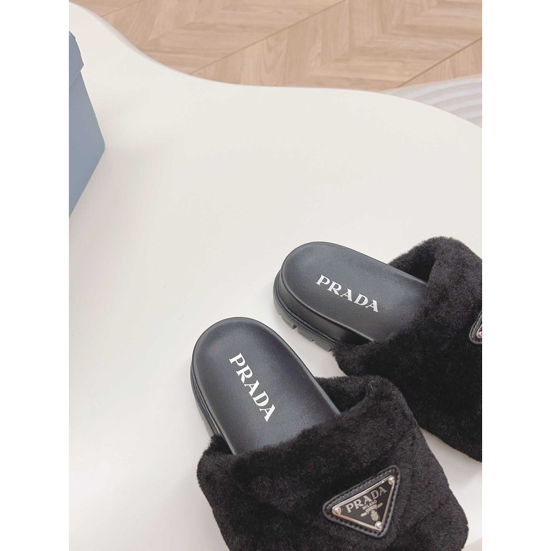 Pra*a sheepskin slip-on sandals black