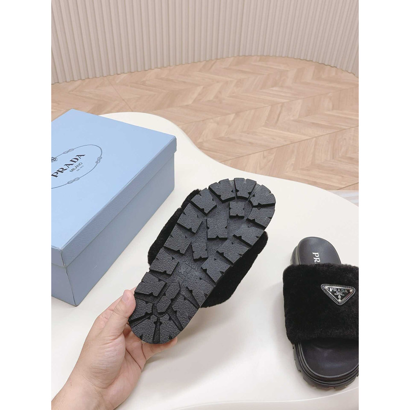 Pra*a sheepskin slip-on sandals black