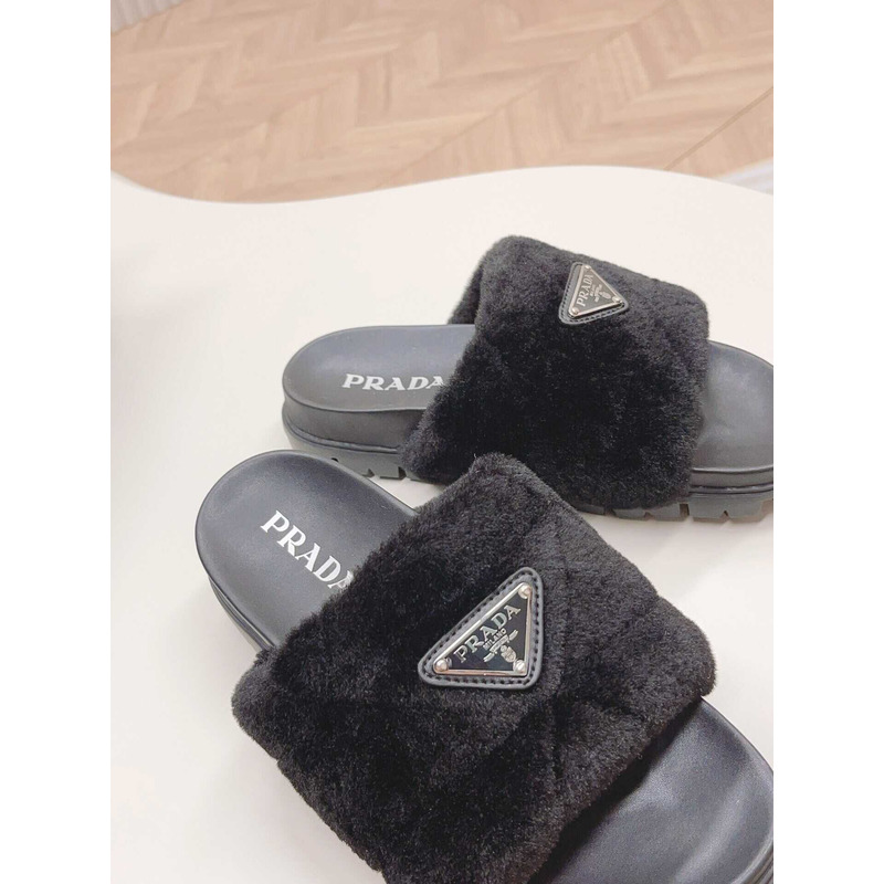 Pra*a sheepskin slip-on sandals black