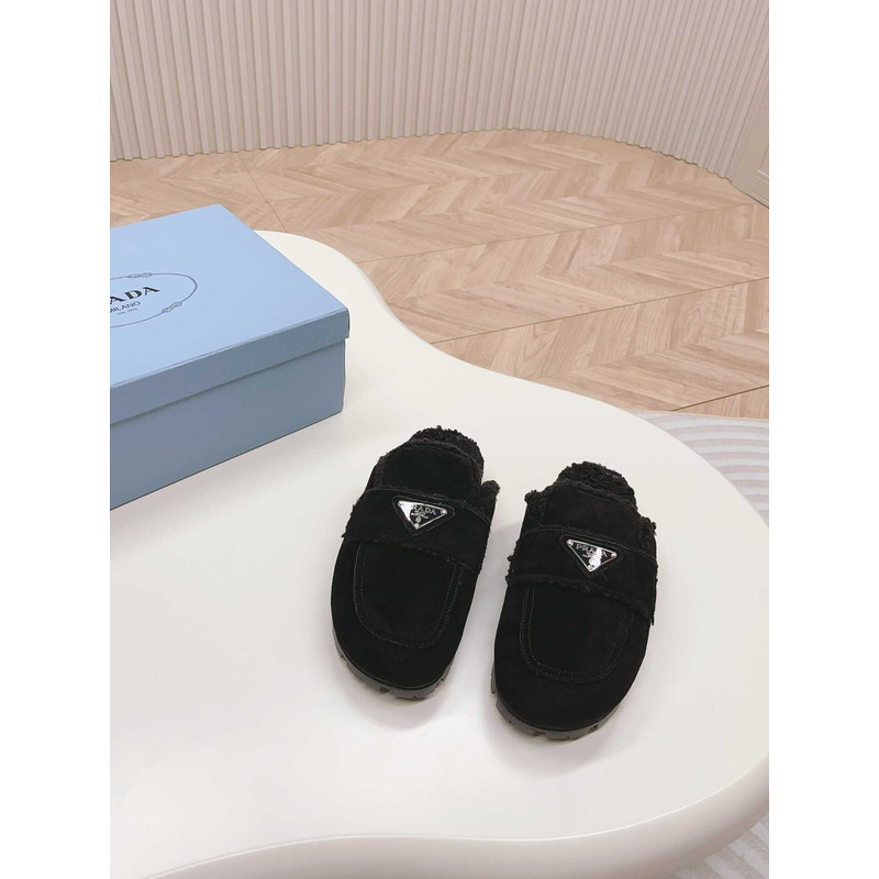 Pra*a logo-plaque shearling slippers black