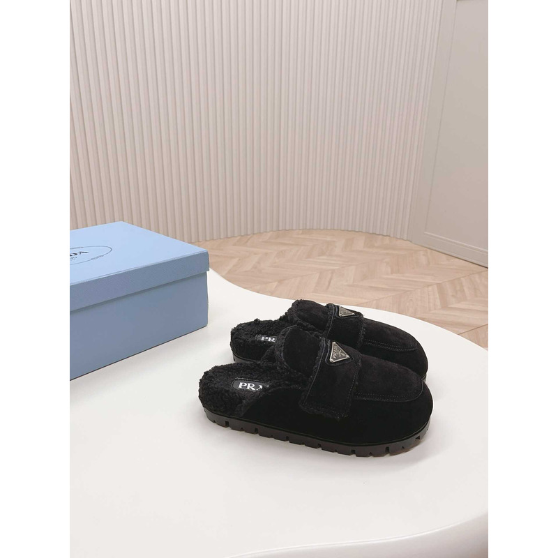 Pra*a logo-plaque shearling slippers black