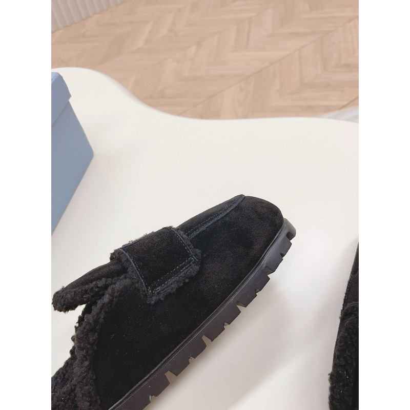 Pra*a logo-plaque shearling slippers black