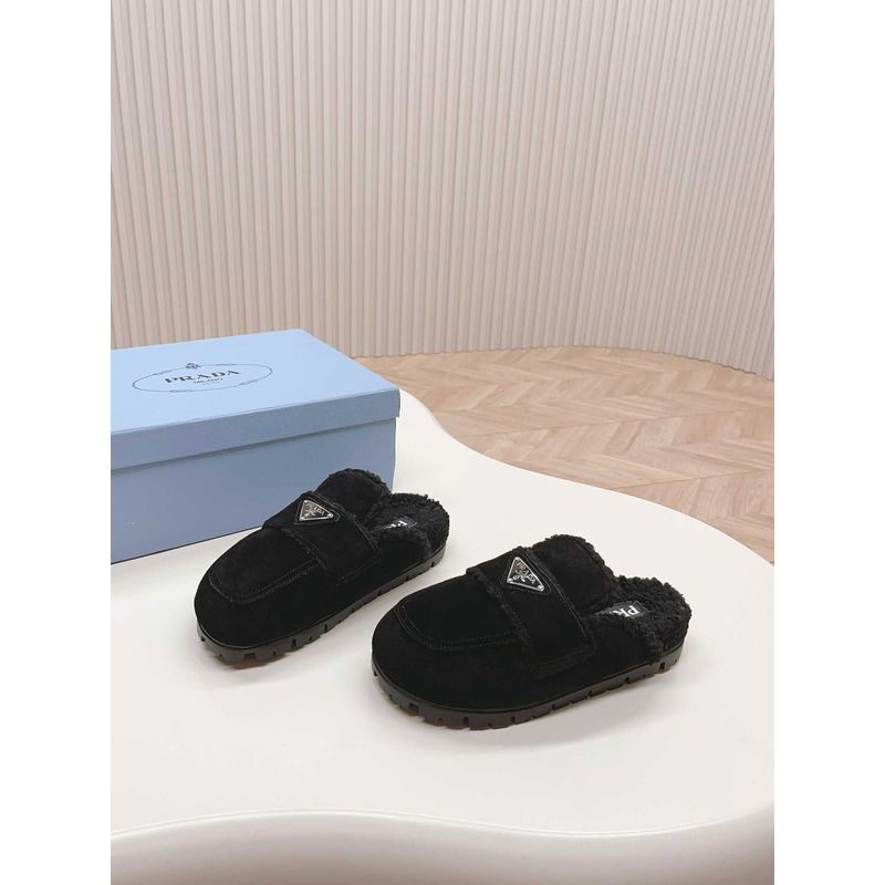 Pra*a logo-plaque shearling slippers black