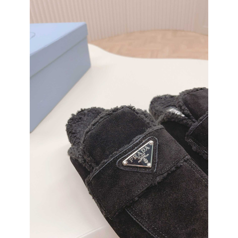 Pra*a logo-plaque shearling slippers black