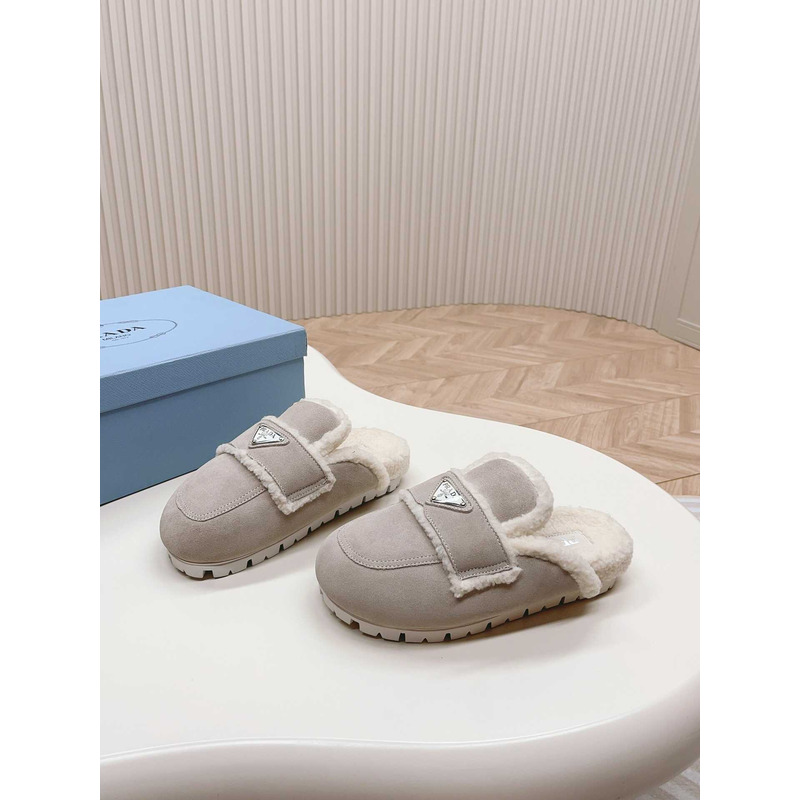 Pra*a logo-plaque shearling slippers grey