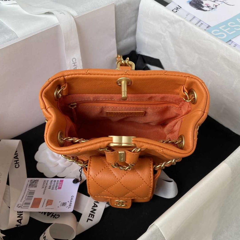 Ch*el small backpack calfskin & gold-tone metal orange