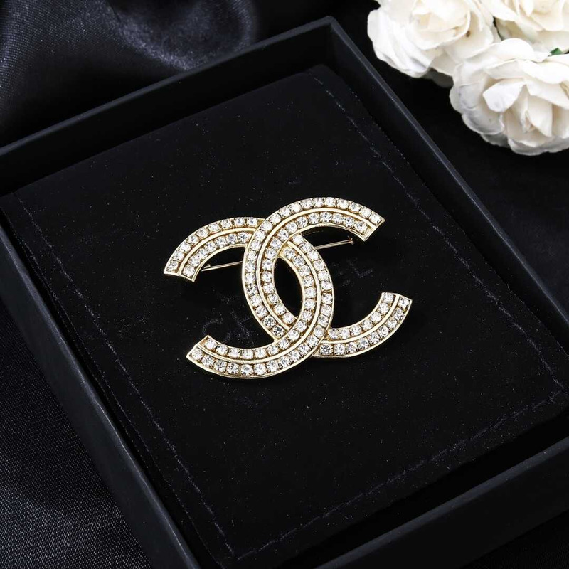 Ch*el cc pin & brooche