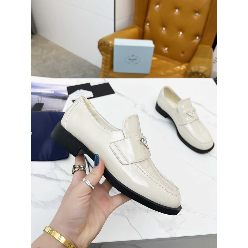 Pra*a patent leather loafers white