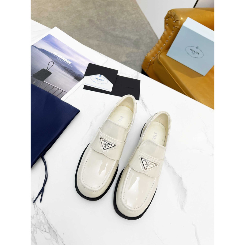 Pra*a patent leather loafers white