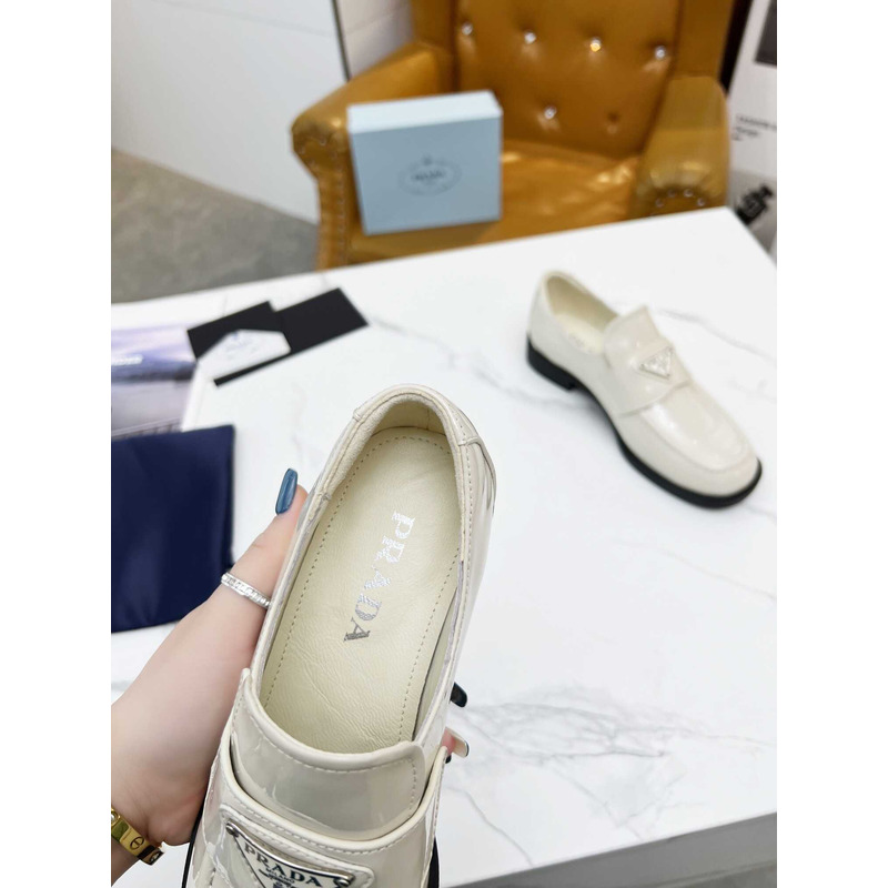 Pra*a patent leather loafers white