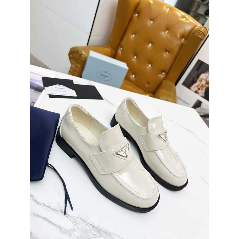 Pra*a patent leather loafers white