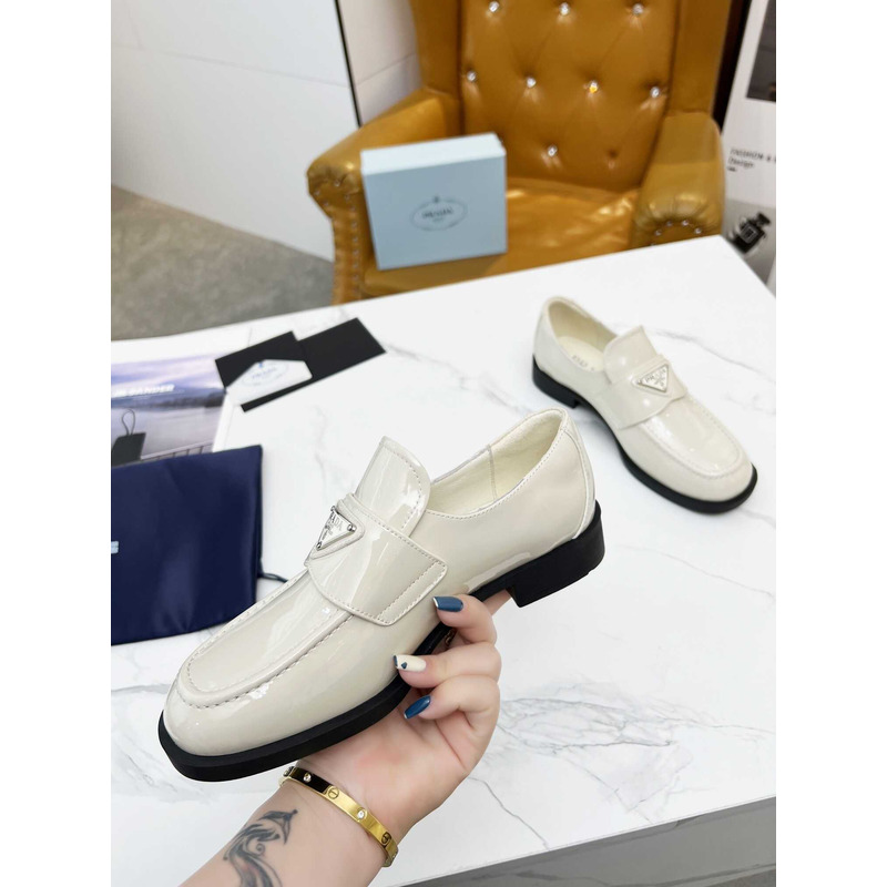 Pra*a patent leather loafers white