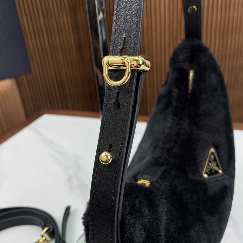 Pra*a arqué shearling and leather shoulder bag black