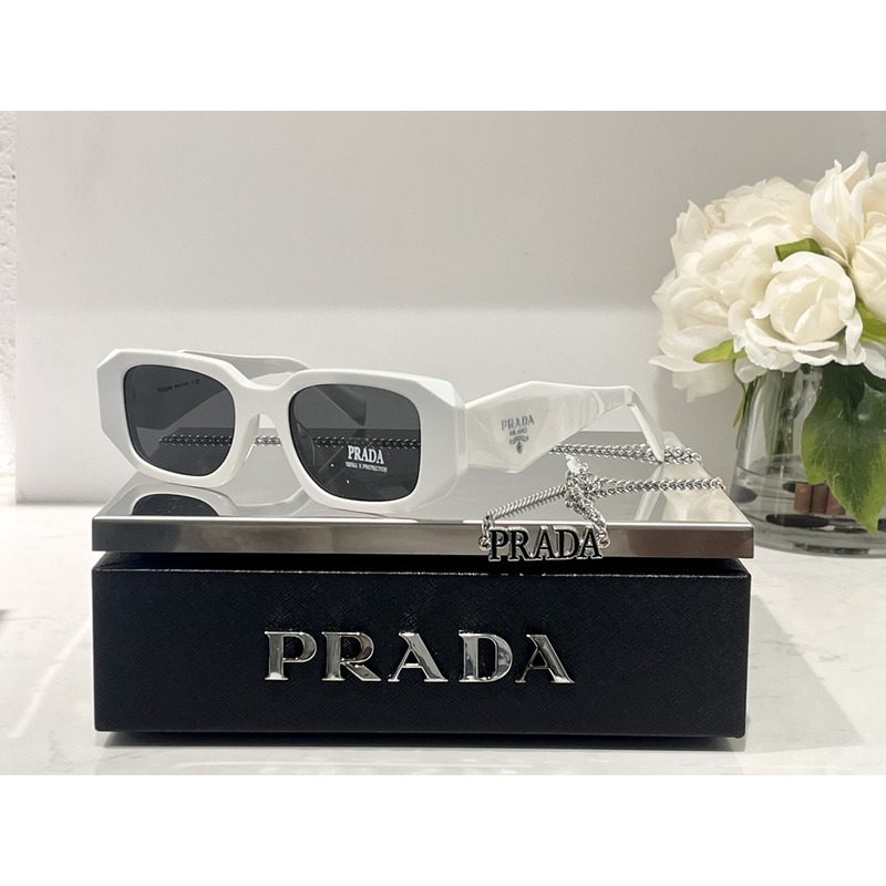 Pra*a sunglasses with Pra*a logo slate gray lenses white