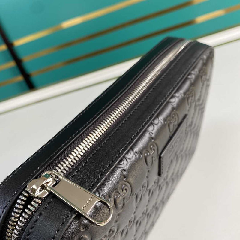 G*u*i gg sup*e embossed clutch black