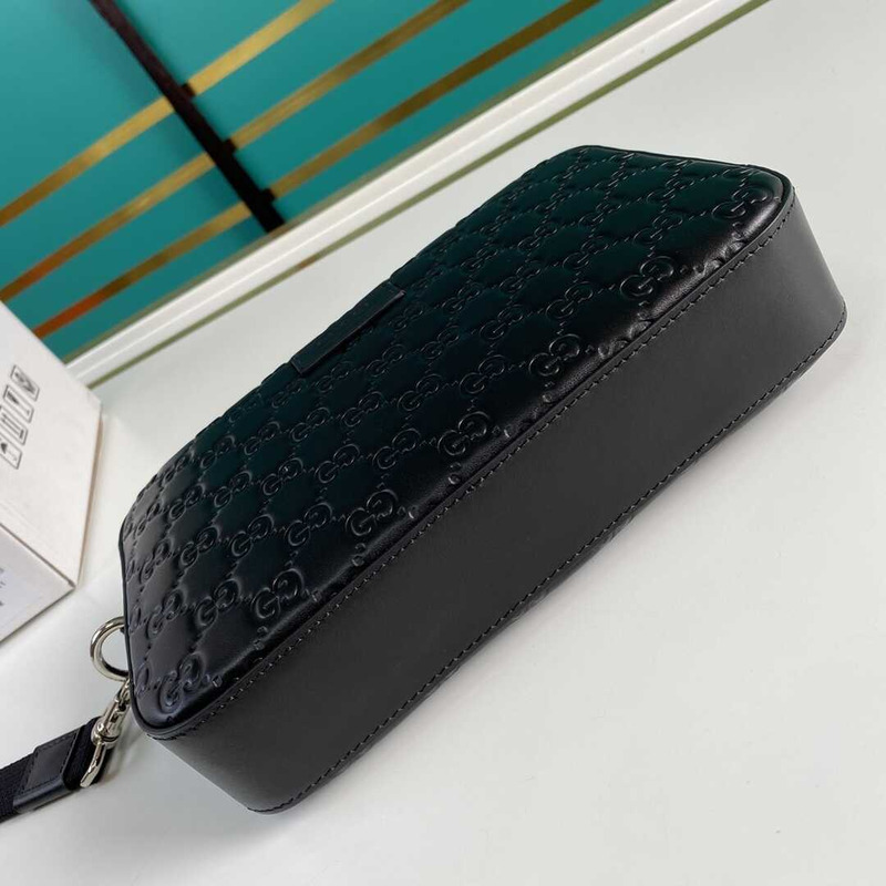 G*u*i gg sup*e embossed clutch black