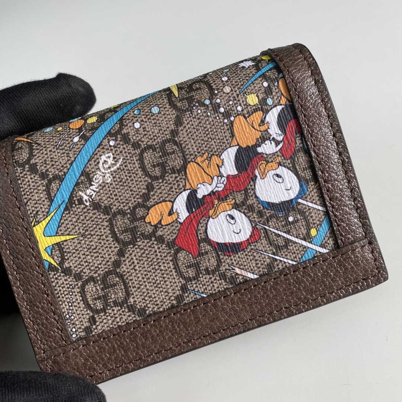 G*u*i x disney donald duck clutch