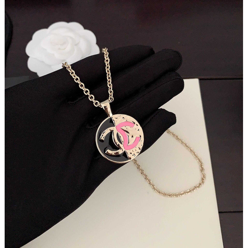 Ch*el pendant necklace metal gold black and pink