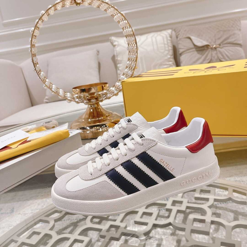 g*u*i x Ad*s gazelle sneakers white