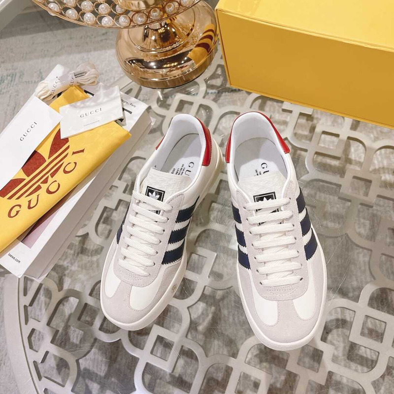 g*u*i x Ad*s gazelle sneakers white