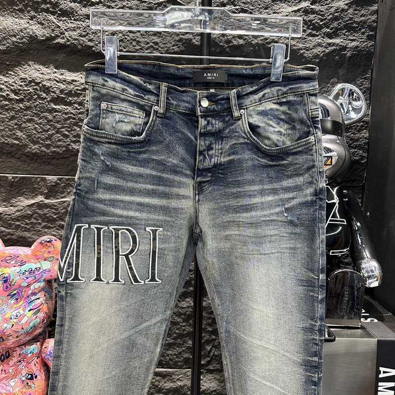 Amiri Logo Distressed Skinny Jeans