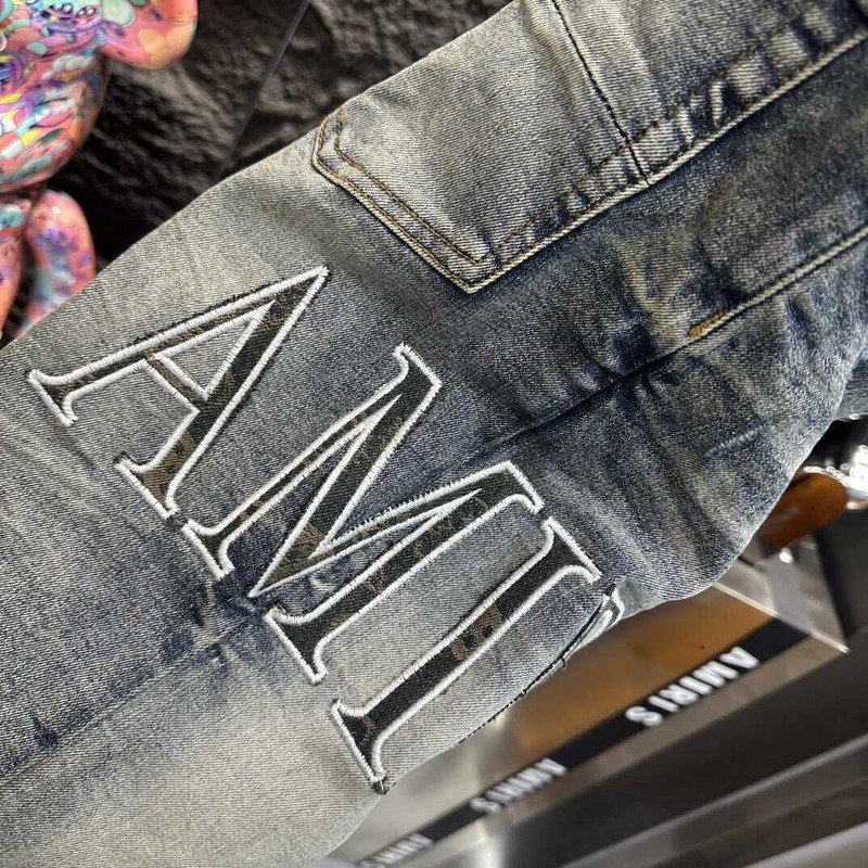 Amiri Logo Distressed Skinny Jeans