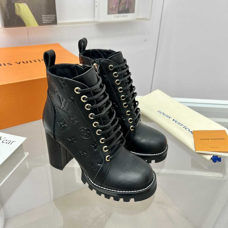 l**is V*t*n calfskin ankle boots black