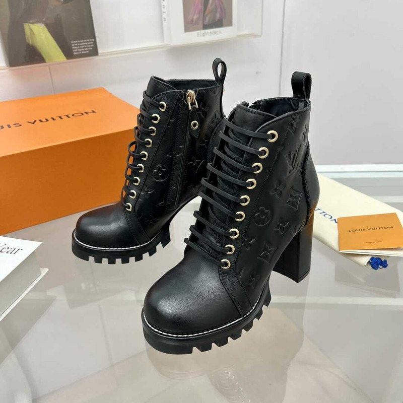 l**is V*t*n calfskin ankle boots black