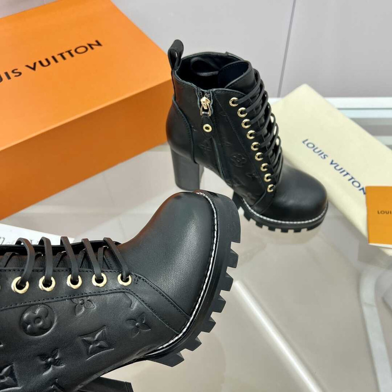 l**is V*t*n calfskin ankle boots black