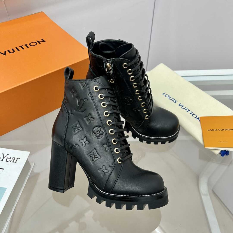 l**is V*t*n calfskin ankle boots black