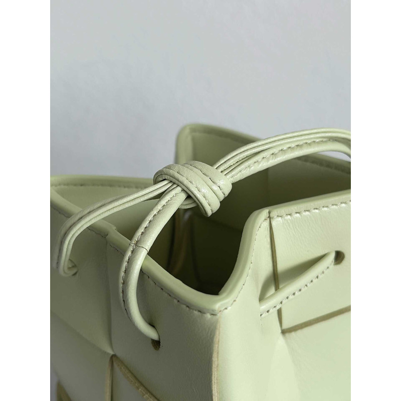 Bo*te*ga ve*ne*ta mini cassette bucket bag in light green