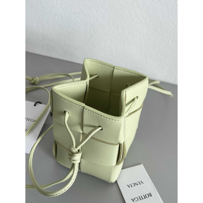 Bo*te*ga ve*ne*ta mini cassette bucket bag in light green