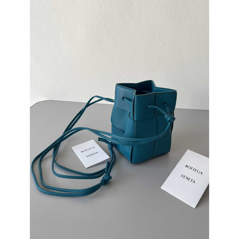 Bo*te*ga ve*ne*ta mini cassette bucket bag in blue