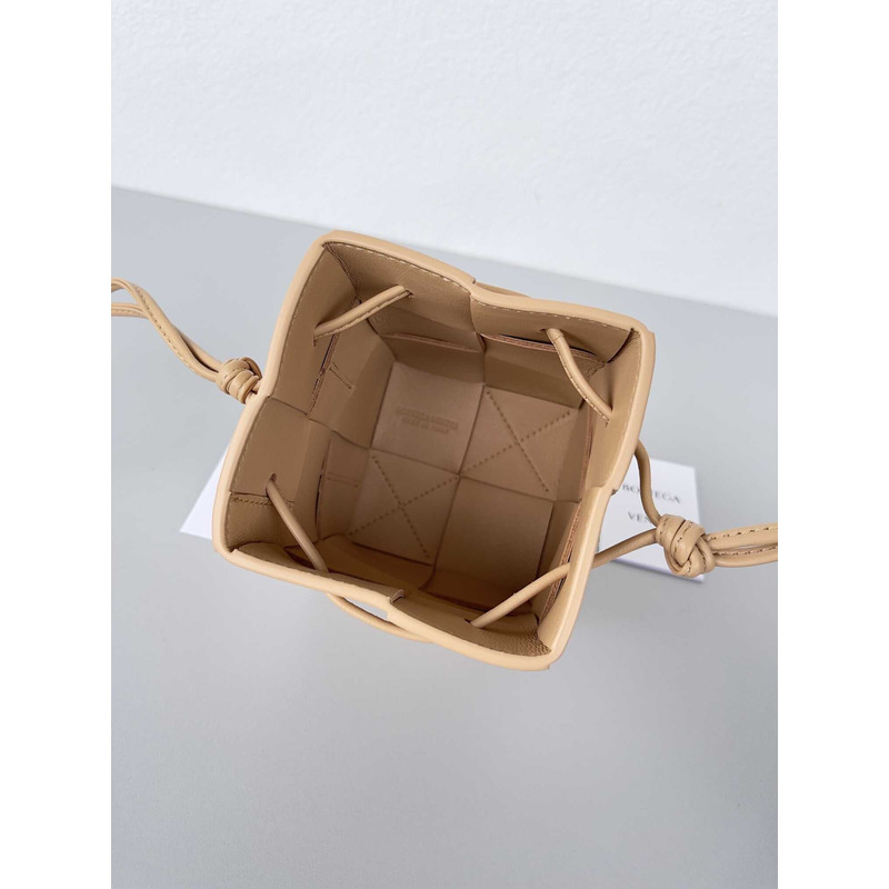 Bo*te*ga ve*ne*ta mini cassette bucket bag in porridge